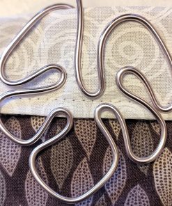 Der Verschluss kann als Accessoires oder als Klammer genutzt werden.